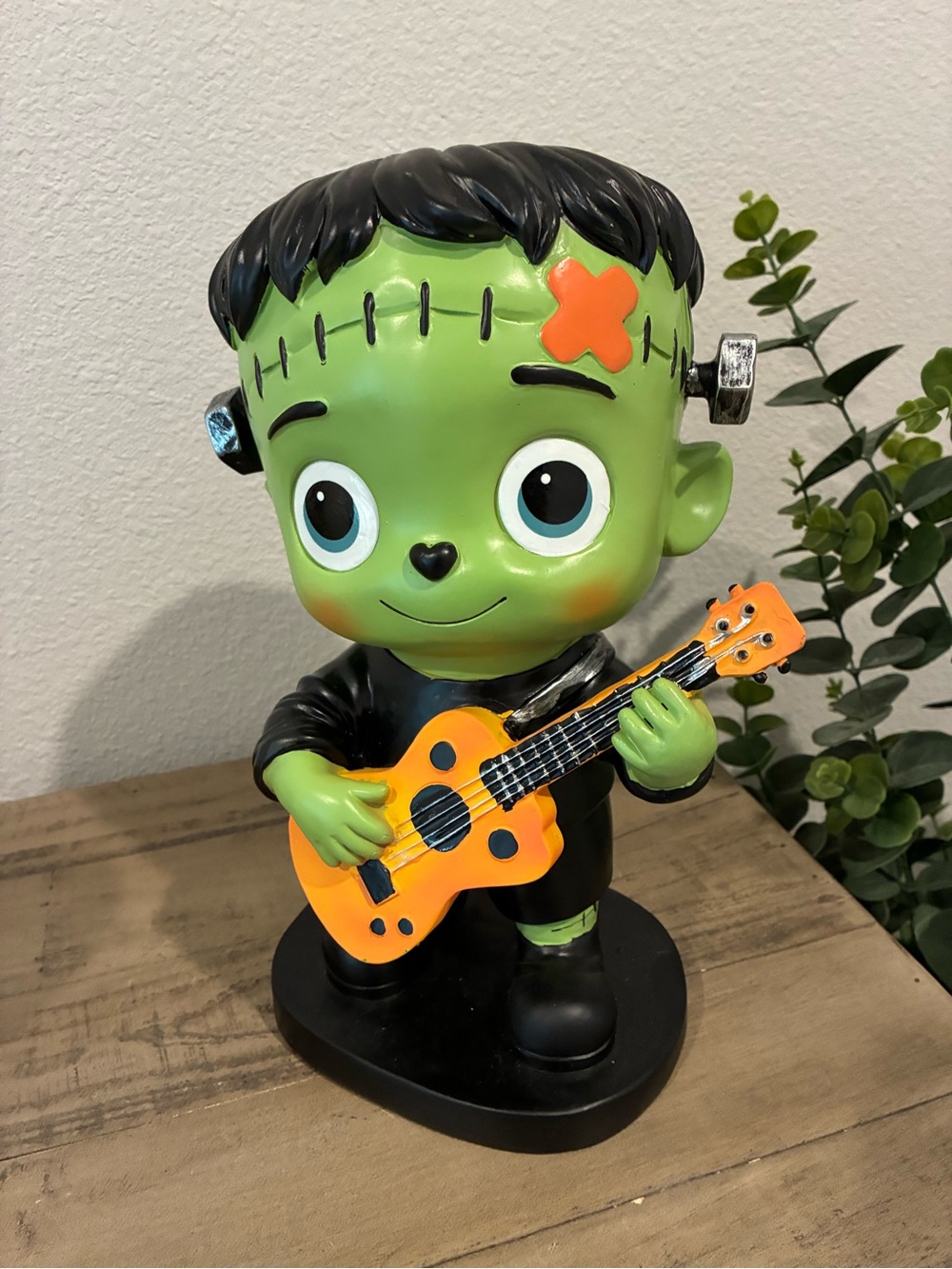 Child Frankenstein Playing Guitar Figurine.